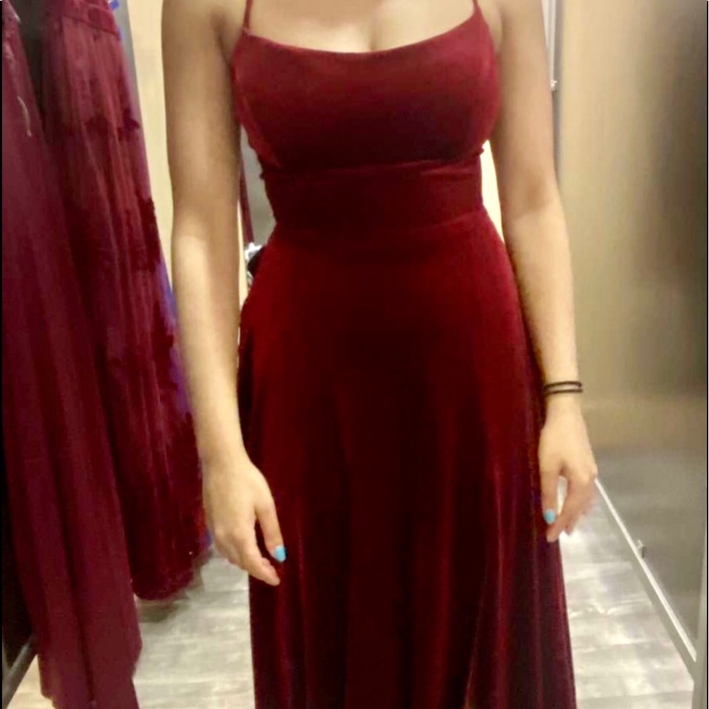 I am seeking this beautiful prom dress it’s a dark red and an open back! - Picture 2 of 2
